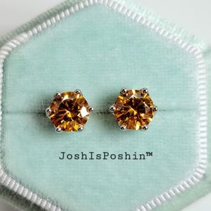 2CT. T.W. Orange Moissanite round cut stud earrings in sterling silver